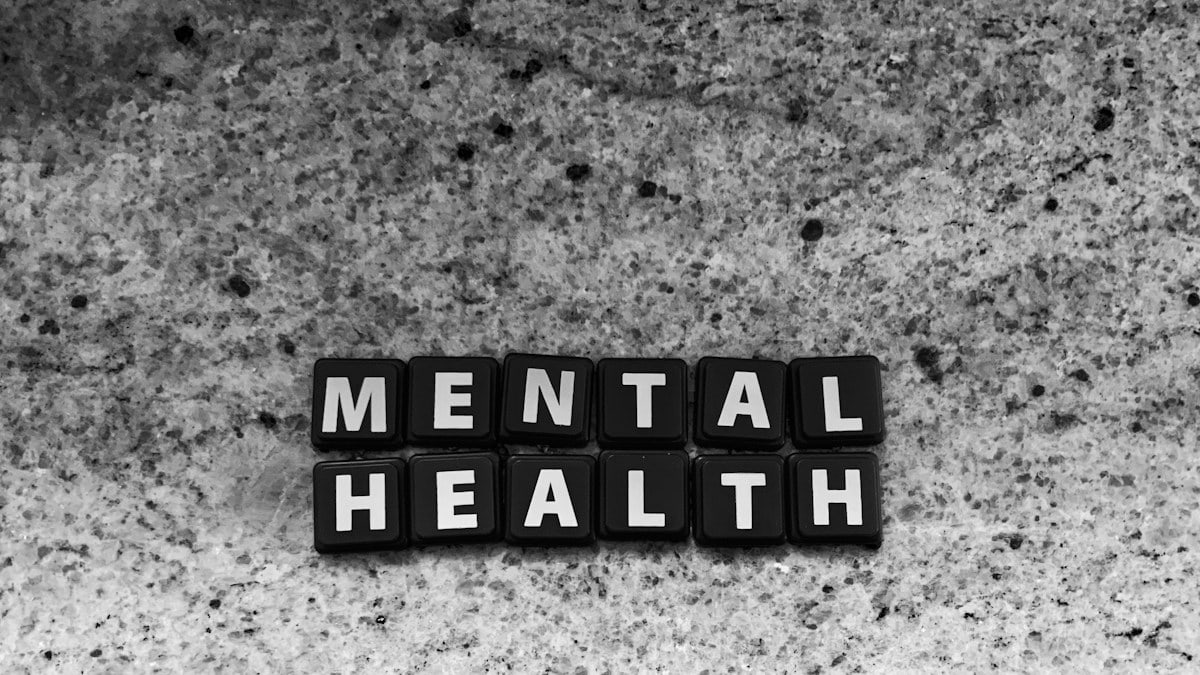 a black and white photo of the word mental health